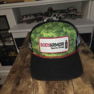New Era Green and Black Camo Trucker Hat